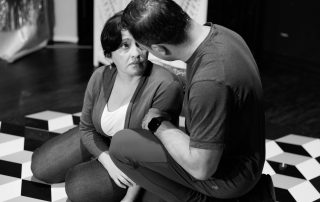 Actor and director reviewing script during Constellations rehearsal, discussing scene work ahead of Edinburgh Fringe 2026