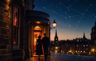 A couple approaching an intimate Edinburgh theatre at night